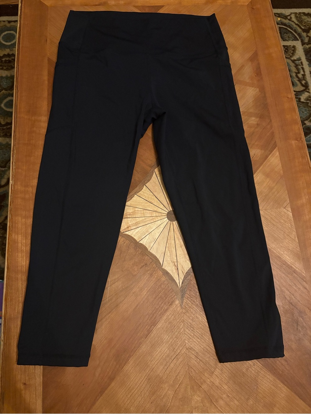 ZYIA Black High-Rise Performance Leggings with pockets, shorter length